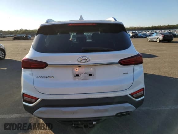 ✅ 2019 Hyundai Santa Fe SEL • VIN: 5NMS3CAD1KH103594 • Lot: 79539543. Wystawiony na Copart z przebiegiem 27 112 mil. Bezpłatny archiwum sprzedaży aukcyjnych z USA i szczegółowy raport historii pojazdu na DreamBid. Zdjęcie 6.