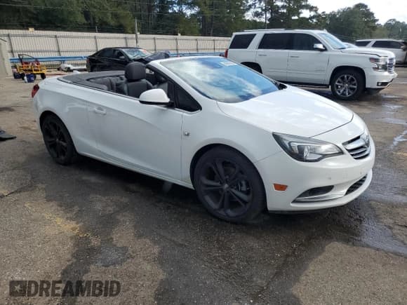 ✅ 2016 Buick Cascada Premium • VIN: W04WT3N52GG122345 • Lot: 84062985. Wystawiony na Copart z przebiegiem 103 646 mil. Bezpłatny archiwum sprzedaży aukcyjnych z USA i szczegółowy raport historii pojazdu na DreamBid. Zdjęcie 4.