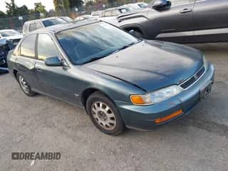 1996 Honda Accord LX with VIN 1HGCD5633TA017875, listed as a IAAI auction lot 43558113 with 299,414 mi miles and . Bid and sale history available at DreamBid. Image 1.