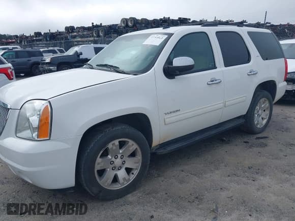 ✅ 2014 GMC Yukon SLT • VIN: 1GKS1CE08ER245345 • Lot: 42354541. Listed on IAAI with 243,152 mi. Free auction sales archive from the USA and detailed vehicle history report at DreamBid. Image 2.