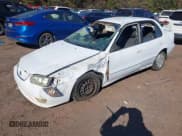 ✅ 2002 Toyota Corolla CE • VIN: 1NXBR12E32Z564276 • Lot: 43604334. Listed on IAAI with 364,435 mi. Free auction sales archive from the USA and detailed vehicle history report at DreamBid. Image 2.