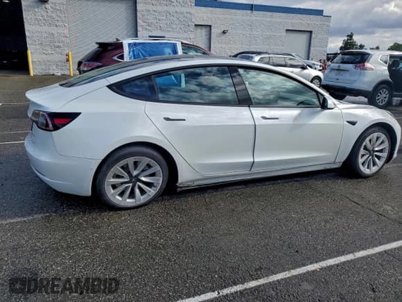 ✅ 2022 Tesla Model 3 Long Range • VIN: 5YJ3E1EB2NF293469 • Лот: 94108795. Опубликован ранее на Copart с пробегом 69 075 миль. Бесплатный доступ к архиву аукционных продаж из США и подробный отчёт об истории автомобиля на DreamBid. Изображение 3.