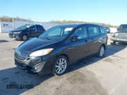 ✅ 2013 Mazda 5 Touring • VIN: JM1CW2CL9D0150904 • Lot: 42017508. Listed on IAAI with 165,192 mi. Free auction sales archive from the USA and detailed vehicle history report at DreamBid. Image 2.