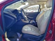 ✅ 2015 Ford Focus Titanium • VIN: 1FADP3N23FL213028 • Lot: 93052655. Wystawiony na Copart z przebiegiem 112 741 mil. Bezpłatny archiwum sprzedaży aukcyjnych z USA i szczegółowy raport historii pojazdu na DreamBid. Zdjęcie 7.