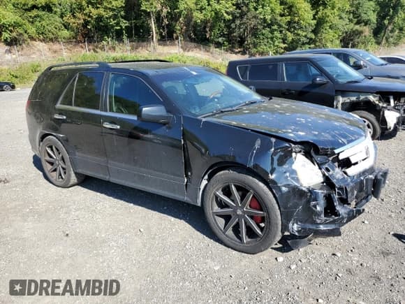 ✅ 2008 Cadillac SRX AWD • VIN: 1GYEE437080142958 • Lot: 71080485. Wystawiony na Copart z przebiegiem 185 346 mil. Bezpłatny archiwum sprzedaży aukcyjnych z USA i szczegółowy raport historii pojazdu na DreamBid. Zdjęcie 4.