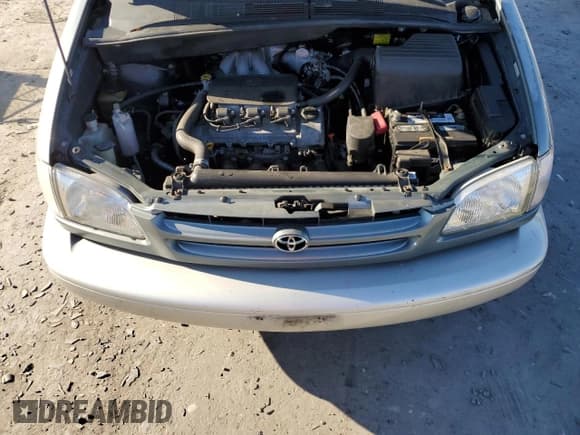 ✅ 2000 Toyota Sienna LE • VIN: 4T3ZF13C2YU281355 • Lot: 76415954. Listed on Copart with 133,763 mi. Free auction sales archive from the USA and detailed vehicle history report at DreamBid. Image 12.