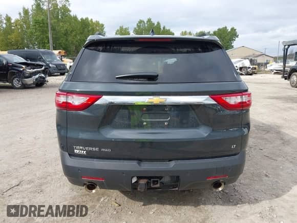 2019 Chevrolet Traverse LT Cloth z VIN 1GNEVMKW7KJ238111, wystawiony jako IAAI lot #43282872 z przebiegiem 122 571 mil mil oraz . Historia ofert i sprzedaży dostępna na DreamBid. Obrazek 17.