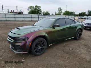 2018 Dodge Charger Police z VIN 2C3CDXKTXJH319571, wystawiony jako Copart lot #61125315 z przebiegiem 169 146 mil mil oraz Szkoda całkowita • Salvage title. Historia ofert i sprzedaży dostępna na DreamBid. Obrazek 1.