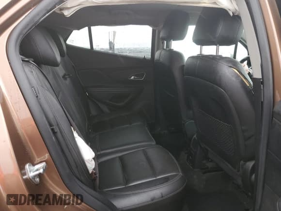 ✅ 2016 Buick Encore Premium • VIN: KL4CJDSBXGB633968 • Lot: 86629665. Listed on Copart with 61,537 mi. Free auction sales archive from the USA and detailed vehicle history report at DreamBid. Image 11.