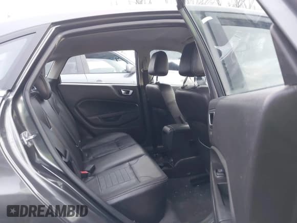 ✅ 2018 Ford Fiesta Titanium • VIN: 3FADP4CJ8JM117662 • Lot: 41199756. Listed on IAAI with 101,625 mi. Free auction sales archive from the USA and detailed vehicle history report at DreamBid. Image 8.