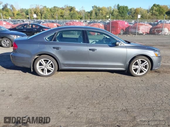 ✅ 2015 Volkswagen Passat SE • VIN: 1VWBV7A36FC078234 • Лот: 43385672. Опубликован ранее на IAAI с пробегом 102 906 миль. Бесплатный доступ к архиву аукционных продаж из США и подробный отчёт об истории автомобиля на DreamBid. Изображение 13.