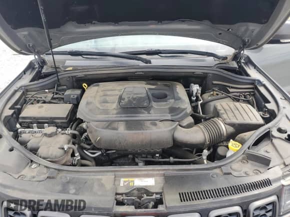 2020 Jeep Grand Cherokee Trailhawk с VIN 1C4RJFLG2LC303395, выставлен на аукционе Copart как лот 84279645 с пробегом 122 976 миль миль и Списание • Salvage title. История ставок и продаж доступна на DreamBid. Изображение 12.