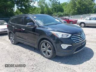 2016 Hyundai Santa Fe Limited z VIN KM8SRDHF2GU138863, wystawiony jako IAAI lot #42659525 z przebiegiem 228 127 mil mil oraz . Historia ofert i sprzedaży dostępna na DreamBid. Obrazek 1.