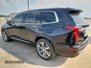 ✅ 2021 Cadillac XT6 Premium Luxury • VIN: 1GYKPCRS4MZ186440 • Лот: 71834115. Опубликован ранее на Copart с пробегом 33 835 миль. Бесплатный доступ к архиву аукционных продаж из США и подробный отчёт об истории автомобиля на DreamBid. Изображение 2.
