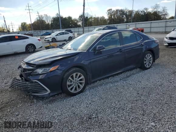 2022 Toyota Camry LE с VIN 4T1R11BK3NU060035, выставлен на аукционе Copart как лот 89728225 с пробегом 25 477 миль миль и Списание • Salvage title. История ставок и продаж доступна на DreamBid. Изображение 1.
