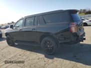 ✅ 2022 Chevrolet Suburban RST • VIN: 1GNSKEKD0NR296633 • Lot: 54446415. Listed on Copart with 34,461 mi. Free auction sales archive from the USA and detailed vehicle history report at DreamBid. Image 2.