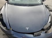 ✅ 2021 Tesla Model 3 Standard Range Plus • VIN: 5YJ3E1EA0MF989690 • Лот: 90286145. Опубликован ранее на Copart с пробегом Не указан. Бесплатный доступ к архиву аукционных продаж из США и подробный отчёт об истории автомобиля на DreamBid. Изображение 11.