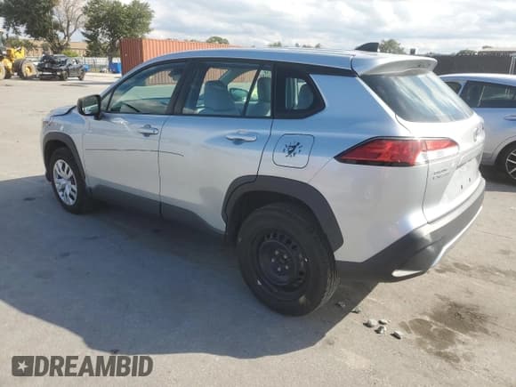 ✅ 2022 Toyota Corolla Cross L • VIN: 7MUAAAAG5NV003392 • Лот: 87477885. Опубликован ранее на Copart с пробегом 62 898 миль. Бесплатный доступ к архиву аукционных продаж из США и подробный отчёт об истории автомобиля на DreamBid. Изображение 2.