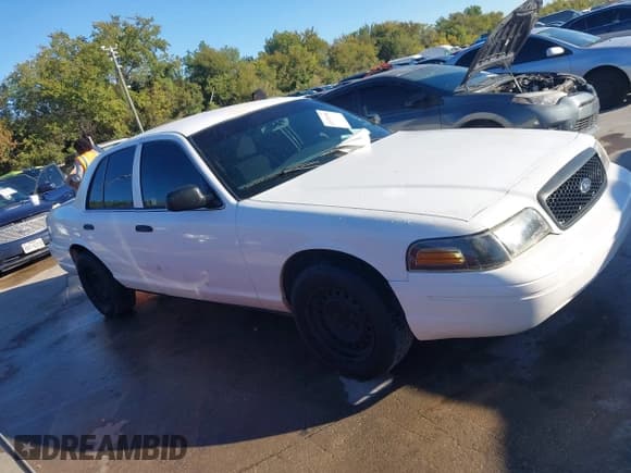 ✅ 2004 Ford Police Interceptor Base w/3.27 Axle • VIN: 2FAFP71W94X120846 • Lot: 43578760. Wystawiony na IAAI z przebiegiem 191 902 mil. Bezpłatny archiwum sprzedaży aukcyjnych z USA i szczegółowy raport historii pojazdu na DreamBid. Zdjęcie 13.