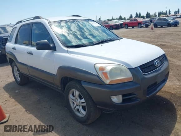 ✅ 2006 Kia Sportage LX • VIN: KNDJF723067280487 • Лот: 42609949. Опубликован ранее на IAAI с пробегом 263 630 миль. Бесплатный доступ к архиву аукционных продаж из США и подробный отчёт об истории автомобиля на DreamBid. Изображение 1.