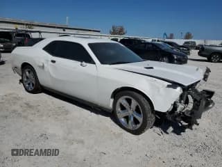 ✅ 2012 Dodge Challenger SXT • VIN: 2C3CDYAG4CH206728 • Lot: 74813574. Wystawiony na Copart z przebiegiem 158 848 mil. Bezpłatny archiwum sprzedaży aukcyjnych z USA i szczegółowy raport historii pojazdu na DreamBid. Zdjęcie 4.