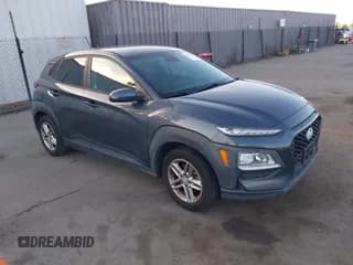 ✅ 2021 Hyundai Kona SE • VIN: KM8K12AAXMU703673 • Лот: 43545133. Опубликован ранее на IAAI с пробегом 106 576 миль. Бесплатный доступ к архиву аукционных продаж из США и подробный отчёт об истории автомобиля на DreamBid. Изображение 1.