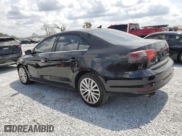 ✅ 2015 Volkswagen Jetta SE • VIN: 3VWD17AJ1FM238876 • Lot: 58957215. Listed on Copart with 122,705 mi. Free auction sales archive from the USA and detailed vehicle history report at DreamBid. Image 2.