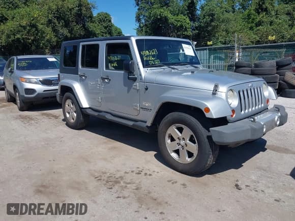 ✅ 2008 Jeep Wrangler Unlimited Sahara • VIN: 1J8GA591X8L628123 • Lot: 43102623. Listed on IAAI with 231,500 mi. Free auction sales archive from the USA and detailed vehicle history report at DreamBid. Image 1.