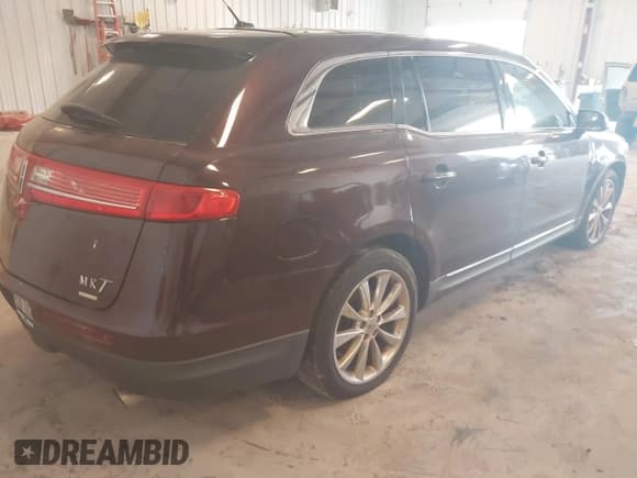 ✅ 2011 Lincoln MKT EcoBoost • VIN: 2LMHJ5AT8BBJ51451 • Lot: 42392934. Listed on IAAI with 168,128 mi. Free auction sales archive from the USA and detailed vehicle history report at DreamBid. Image 4.