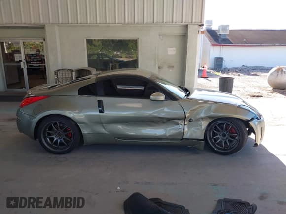 ✅ 2006 Nissan 350Z • VIN: JN1AZ34D66M312675 • Lot: 43053662. Listed on IAAI with 93,756 mi. Free auction sales archive from the USA and detailed vehicle history report at DreamBid. Image 13.