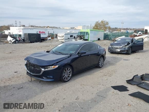 ✅ 2022 Mazda 3 Select • VIN: 3MZBPABL3NM309450 • Lot: 43650319. Listed on IAAI with 32,846 mi. Free auction sales archive from the USA and detailed vehicle history report at DreamBid. Image 2.