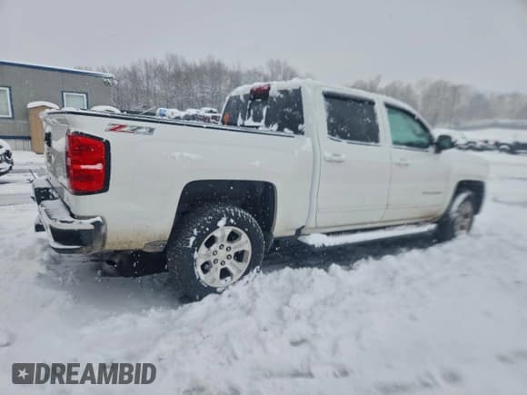 ✅ 2016 Chevrolet Silverado 1500 LT • VIN: 3GCUKREC2GG226968 • Lot: 94394705. Listed on Copart with 165,510 mi. Free auction sales archive from the USA and detailed vehicle history report at DreamBid. Image 3.
