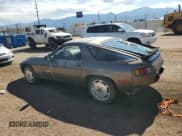 ✅ 1984 Porsche 928 • VIN: WP0JB0929ES860736 • Lot: 63927165. Wystawiony na Copart z przebiegiem 125 989 mil. Bezpłatny archiwum sprzedaży aukcyjnych z USA i szczegółowy raport historii pojazdu na DreamBid. Zdjęcie 2.