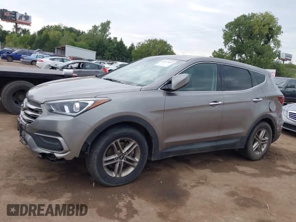 ✅ 2018 Hyundai Santa Fe 2.4L • VIN: 5NMZTDLB9JH078832 • Лот: 43147812. Опубликован ранее на IAAI с пробегом 122 368 миль. Бесплатный доступ к архиву аукционных продаж из США и подробный отчёт об истории автомобиля на DreamBid. Изображение 14.