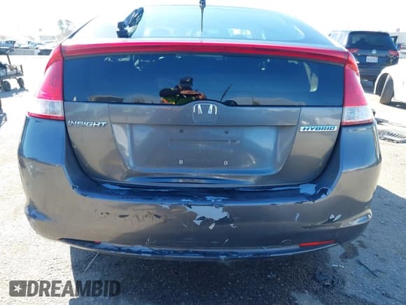 ✅ 2010 Honda Insight LX • VIN: JHMZE2H5XAS004808 • Лот: 43748854. Опубликован ранее на IAAI с пробегом 296 641 миль. Бесплатный доступ к архиву аукционных продаж из США и подробный отчёт об истории автомобиля на DreamBid. Изображение 14.