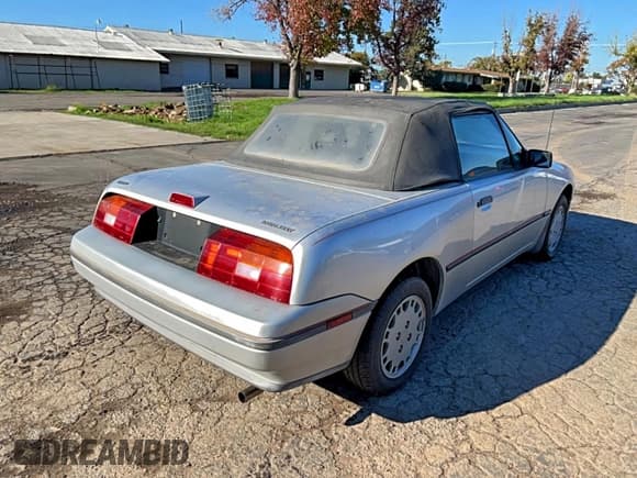 ✅ 1991 Mercury Capri • VIN: 6MPCT01Z9M8615177 • Lot: 94350995. Wystawiony na Copart z przebiegiem 26 702 mil. Bezpłatny archiwum sprzedaży aukcyjnych z USA i szczegółowy raport historii pojazdu na DreamBid. Zdjęcie 4.