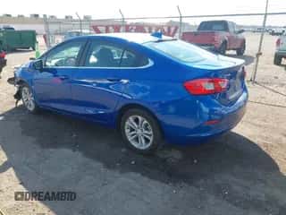 2019 Chevrolet Cruze LT with VIN 1G1BE5SM4K7108535, listed as a IAAI auction lot 43352905 with 102,584 mi miles and . Bid and sale history available at DreamBid. Image 3.