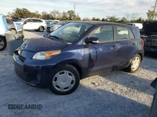 ✅ 2014 Scion xD • VIN: JTKKUPB47E1044075 • Lot: 91970625. Listed on Copart with 121,601 mi. Free auction sales archive from the USA and detailed vehicle history report at DreamBid. Image 1.
