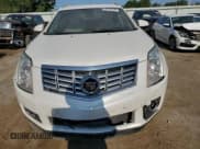 ✅ 2016 Cadillac SRX Premium Collection • VIN: 3GYFNDE32GS548343 • Lot: 63218175. Wystawiony na Copart z przebiegiem 91 265 mil. Bezpłatny archiwum sprzedaży aukcyjnych z USA i szczegółowy raport historii pojazdu na DreamBid. Zdjęcie 5.