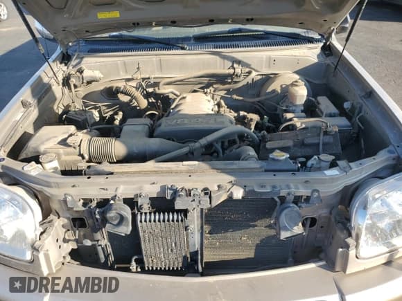 ✅ 2004 Toyota Tundra SR5 • VIN: 5TBET34134S444244 • Лот: 90730365. Опубликован ранее на Copart с пробегом 241 177 миль. Бесплатный доступ к архиву аукционных продаж из США и подробный отчёт об истории автомобиля на DreamBid. Изображение 11.