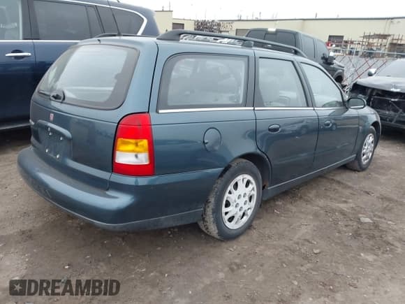 ✅ 2002 Saturn LW • VIN: 1G8JU84F12Y566883 • Lot: 43757094. Listed on IAAI with 215,469 mi. Free auction sales archive from the USA and detailed vehicle history report at DreamBid. Image 4.