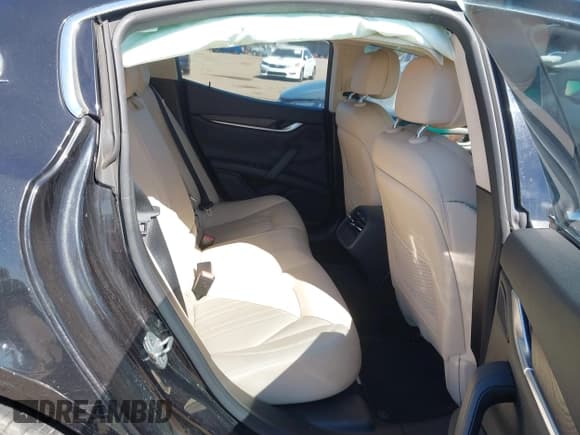 ✅ 2014 Maserati Ghibli • VIN: ZAM57XSA6E1087545 • Lot: 43185040. Listed on IAAI with 79,498 mi. Free auction sales archive from the USA and detailed vehicle history report at DreamBid. Image 8.