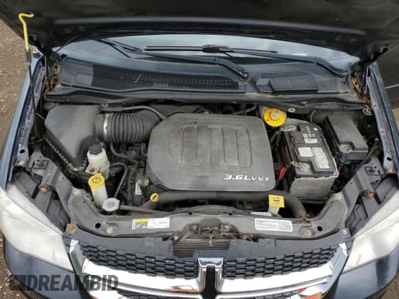 ✅ 2014 Dodge Grand Caravan SE 30th Anniversary • VIN: 2C4RDGBG6ER415500 • Лот: 59614295. Опубликован ранее на Copart с пробегом 169 838 миль. Бесплатный доступ к архиву аукционных продаж из США и подробный отчёт об истории автомобиля на DreamBid. Изображение 12.