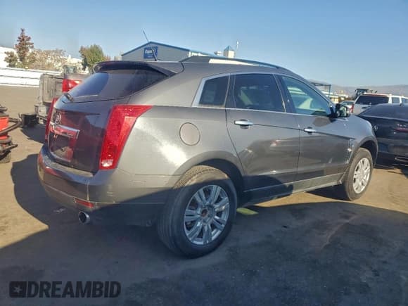 ✅ 2010 Cadillac SRX • VIN: 3GYFNGEY0AS504703 • Лот: 95186505. Опубликован ранее на Copart с пробегом 107 514 миль. Бесплатный доступ к архиву аукционных продаж из США и подробный отчёт об истории автомобиля на DreamBid. Изображение 3.