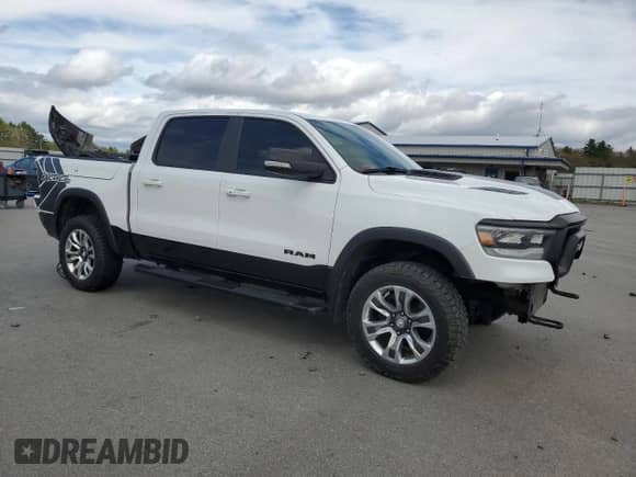 2020 Ram 1500 Rebel z VIN 1C6SRFLM1LN230872, wystawiony jako Copart lot #55671585 z przebiegiem 97 202 mil mil oraz Szkoda całkowita • Salvage title. Historia ofert i sprzedaży dostępna na DreamBid. Obrazek 4.