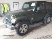 ✅ 2007 Jeep Wrangler Sahara • VIN: 1J4FA54187L125547 • Lot: 43487962. Listed on IAAI with 187,902 mi. Free auction sales archive from the USA and detailed vehicle history report at DreamBid. Image 2.