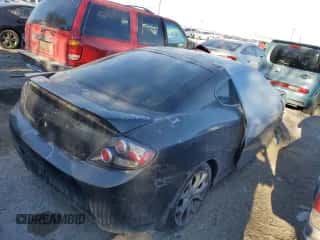 ✅ 2007 Hyundai Tiburon GT • VIN: KMHHN66F67U244091 • Лот: 68401725. Опубликован ранее на Copart с пробегом Не указан. Бесплатный доступ к архиву аукционных продаж из США и подробный отчёт об истории автомобиля на DreamBid. Изображение 3.