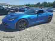 2014 Chevrolet Corvette Z51 1LT z VIN 1G1YG2D78E5120732, wystawiony jako Copart lot #57976955 z przebiegiem 68 193 mil mil oraz Szkoda całkowita • Salvage title. Historia ofert i sprzedaży dostępna na DreamBid. Obrazek 1.