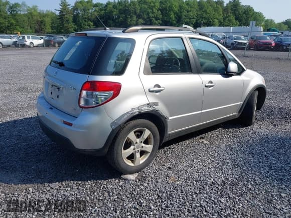 ✅ 2012 Suzuki SX4 Crossover • VIN: JS2YB5A3XC6300736 • Lot: 42428403. Listed on IAAI with 153,499 mi. Free auction sales archive from the USA and detailed vehicle history report at DreamBid. Image 4.