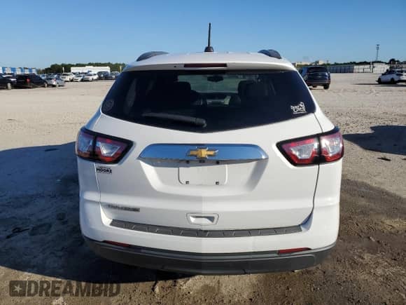 2017 Chevrolet Traverse LS z VIN 1GNKRFEDXHJ312305, wystawiony jako Copart lot #86783215 z przebiegiem 89 465 mil mil oraz Szkoda całkowita • Salvage title. Historia ofert i sprzedaży dostępna na DreamBid. Obrazek 6.